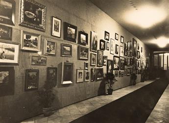 (FASCISM) An album of approximately 47 images displaying an Italian Fascist social groups art collection and learning center.